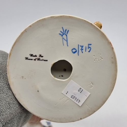 1534 - A mixed group of pottery and porcelain, to include a Capodimonte figure, 25cm high; two Herend pigs,... 