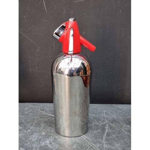1544 - A vintage chrome yacht, 34cm high; together with a similar BOC soda syphon. (2)