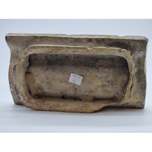 1434 - A Dutch Delft moulded frieze tile, 25cm wide.