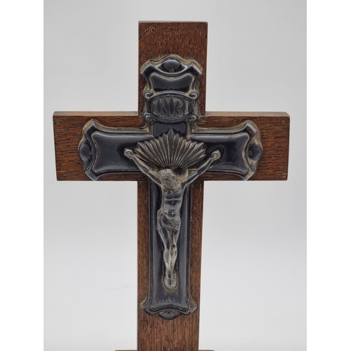 1439 - An oak and electroplate mounted Corpus Christi, 40cm high.