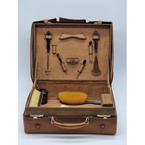 1441 - A leather vanity case, inscribed 'John Bagshaw & Sons, Liverpool', with partial tortoiseshell fi... 