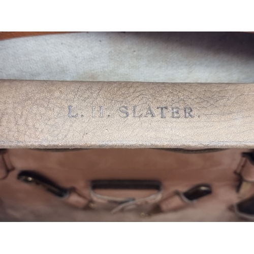 1441 - A leather vanity case, inscribed 'John Bagshaw & Sons, Liverpool', with partial tortoiseshell fi... 