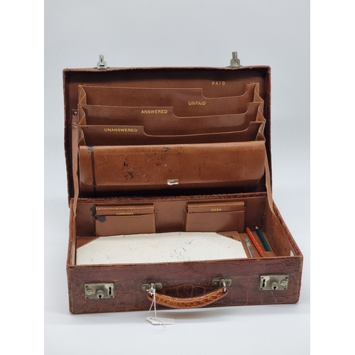1441 - A leather vanity case, inscribed 'John Bagshaw & Sons, Liverpool', with partial tortoiseshell fi... 