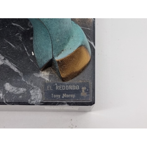 1442 - Tony Morey, 'El Redondo', a patinated bronze sculpture, on marble base, 31cm wide.