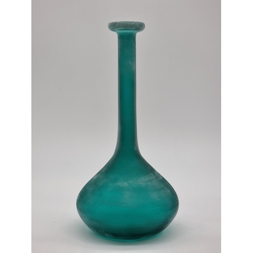 1486 - A Murano green glass bottle vase, by Stefano Toso, signed, 32.5cm high.