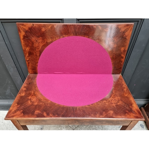 1032 - An unusual 19th century flame mahogany rectangular card table, with pull-out action, 87cm wide.... 