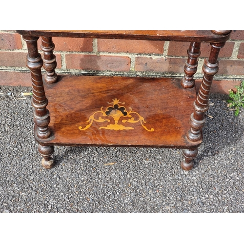 1042 - A Victorian walnut and inlaid four-tier whatnot, 48.5cm wide.
