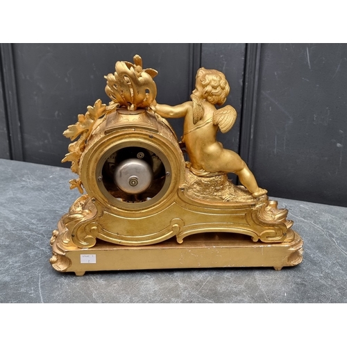 1165 - A Louis XV style gilt metal figural mantel clock, 36.5cm wide, on conforming giltwood stand, total h... 