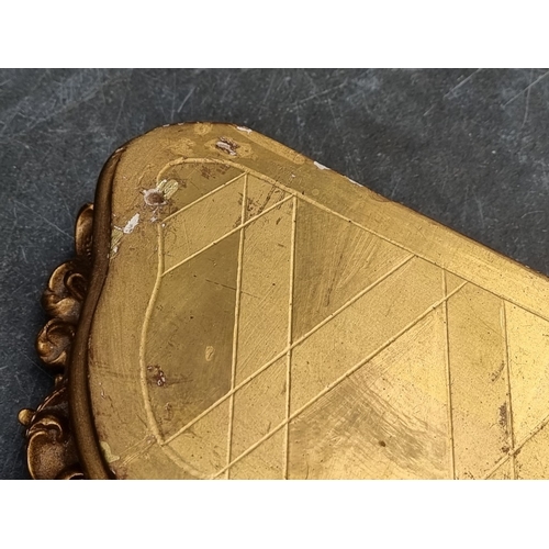 1165 - A Louis XV style gilt metal figural mantel clock, 36.5cm wide, on conforming giltwood stand, total h... 