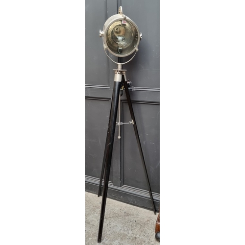 1306 - A modern theatre spotlight, on large tripod stand, approx 194cm high, (dented).