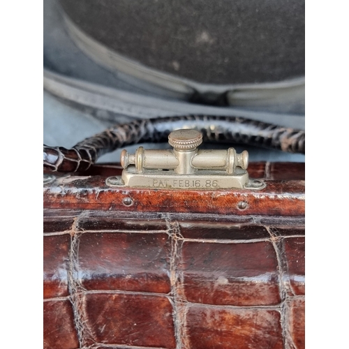 1309 - An unusually small vintage crocodile gladstone type bag, the clasp inscribed 'A.G. & Co', 22.5cm... 