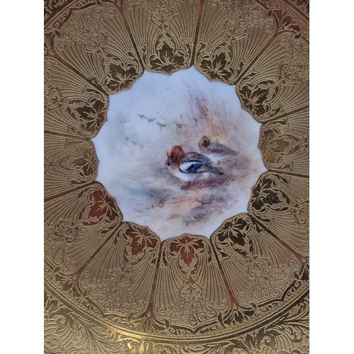 1389 - A good set of six Royal Worcester cabinet plates, each finely painted with a Game Bird by James Stin... 