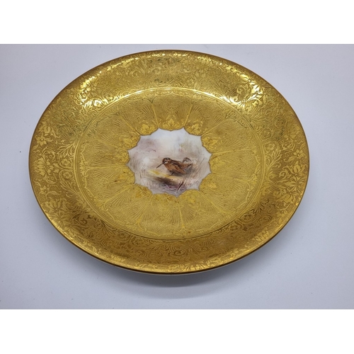 1389 - A good set of six Royal Worcester cabinet plates, each finely painted with a Game Bird by James Stin... 