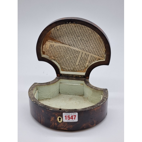 1547 - A simulated tortoiseshell and hobnail studded shell form casket, 18.5cm wide, (warped).... 