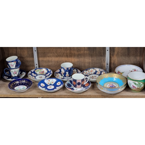 1555 - A collection of 18th century and later English & Continental porcelain tea wares, to include a S... 
