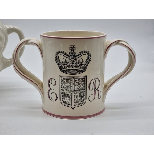 1557 - A Royal Doulton 1953 commemorative Courage Brewery loving cup, 14cm high; together with a novelty Ma... 