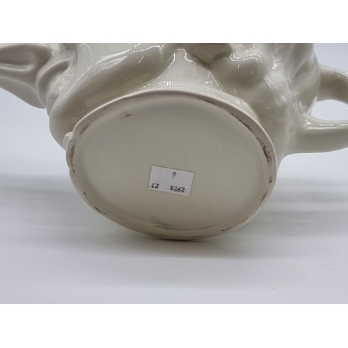 1557 - A Royal Doulton 1953 commemorative Courage Brewery loving cup, 14cm high; together with a novelty Ma... 