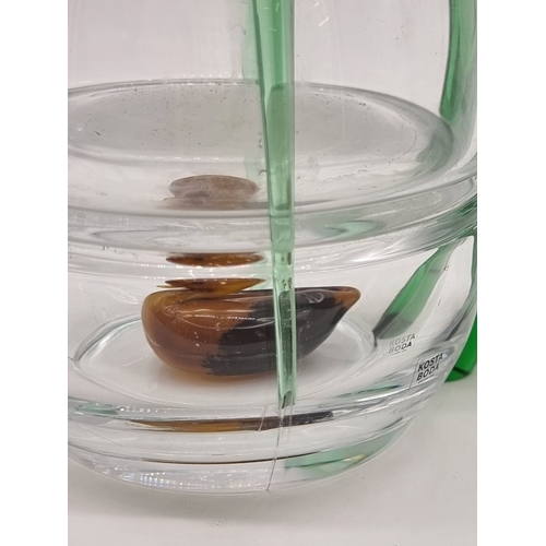 1574 - Three Egyptian style figures, the soapstone Horus 27.5cm high.