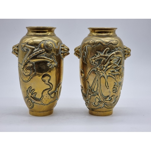 1580 - A pair of Chinese polished bronze dragon vases, Xuande six character seal mark to base, 22cm high.... 