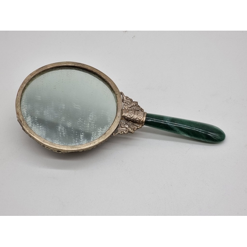 1585 - An Arts & Crafts style oak, copper and enamel casket, 11.5cm wide; together with a copper and br... 