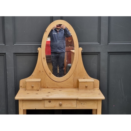 1107 - A Victorian pine mirror back dressing table, 99.5cm wide.