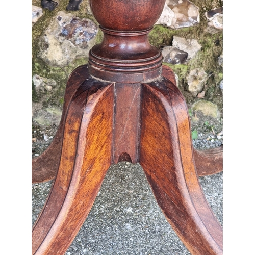 1114 - A 19th century mahogany and ebony strung breakfast table, 146cm wide, (the top now fixed).... 