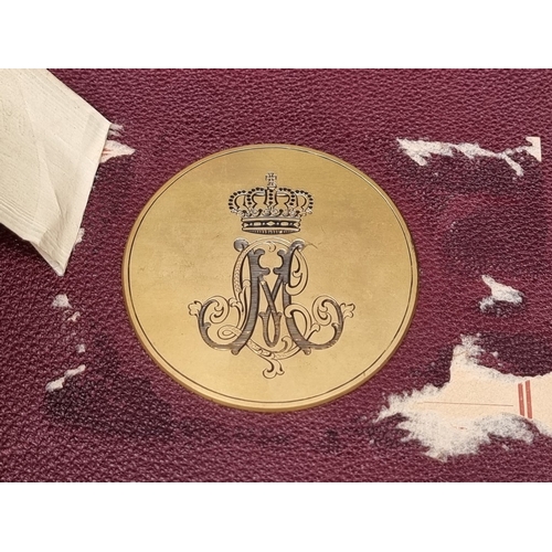 1677 - An interesting and impressive dark red leather jewellery chest, the hinged top applied with gilt bra... 