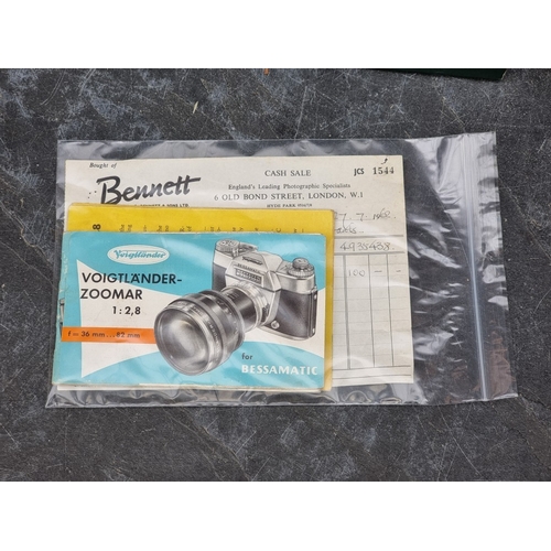 1597 - Cameras: a Voightlander 'Bessamatic', with Voightlander 'Color-Skopar X 1:2.8/50' lens, in leather c... 