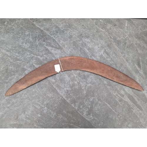 1663 - Ethnographica: a 19th century Australian Aboriginal hardwood boomerang, the upper convex side with f... 