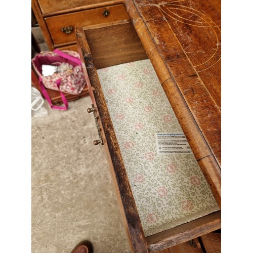 1025 - An 18th century walnut, line inlaid and crossbanded chest of drawers, on bun feet, 94.5cm wide.... 