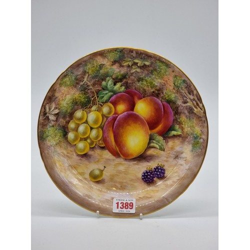 1390 - A Royal Worcester fruit painted cabinet plate, by Freeman, 23cm diameter; together with a small pair... 