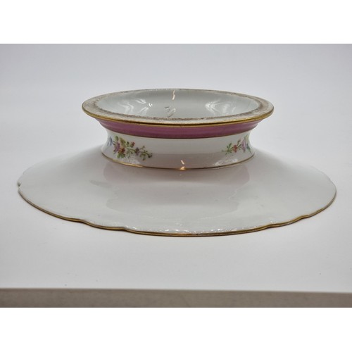 1391 - A Sevres style 'Louis XV' comport, 22.5cm diameter.