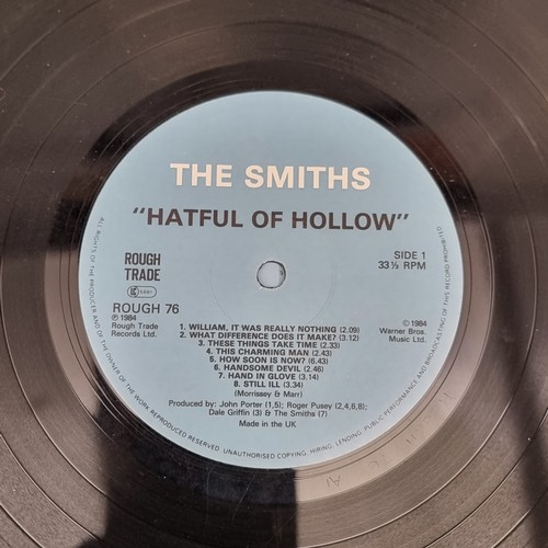 1659 - Vinyl: a group of 33rpm records, to include: Led Zeppelin '1'; Ramones 'Shock Treatment Circular Saw... 