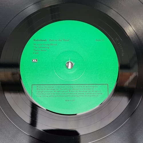 1659 - Vinyl: a group of 33rpm records, to include: Led Zeppelin '1'; Ramones 'Shock Treatment Circular Saw... 