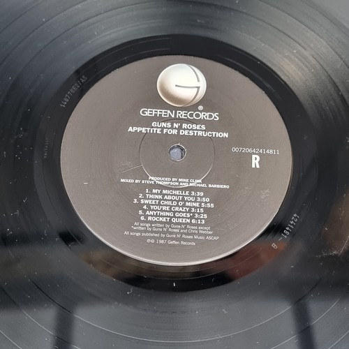 1659 - Vinyl: a group of 33rpm records, to include: Led Zeppelin '1'; Ramones 'Shock Treatment Circular Saw... 