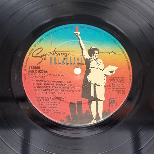 1659 - Vinyl: a group of 33rpm records, to include: Led Zeppelin '1'; Ramones 'Shock Treatment Circular Saw... 