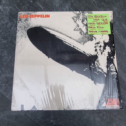 1659 - Vinyl: a group of 33rpm records, to include: Led Zeppelin '1'; Ramones 'Shock Treatment Circular Saw... 