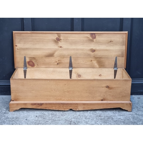 1001 - A large pine coffer, 139cm wide.