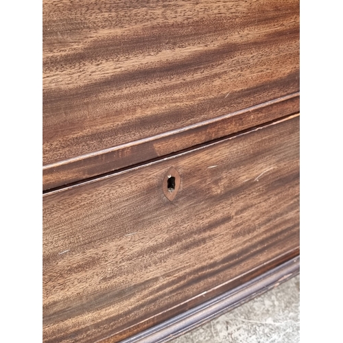 1038 - An early 19th century bowfront four drawer chest, with bone escutcheons, 120cm wide.... 