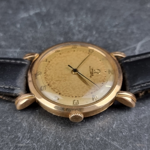 12 - An early 1940s Omega 'Jumbo' 18ct gold automatic wristwatch, 35mm, Ref. 10829286, having 'bumper' ca... 