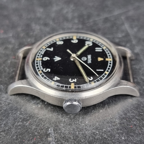 36 - A 1970 military issue Smiths stainless steel manual wind wristwatch, 35mm, Ref. W10, the case back i... 