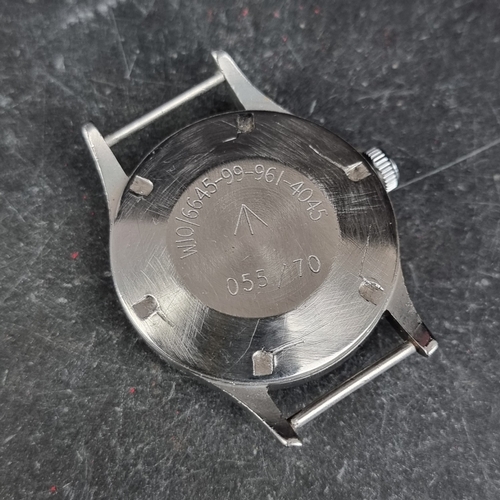 36 - A 1970 military issue Smiths stainless steel manual wind wristwatch, 35mm, Ref. W10, the case back i... 
