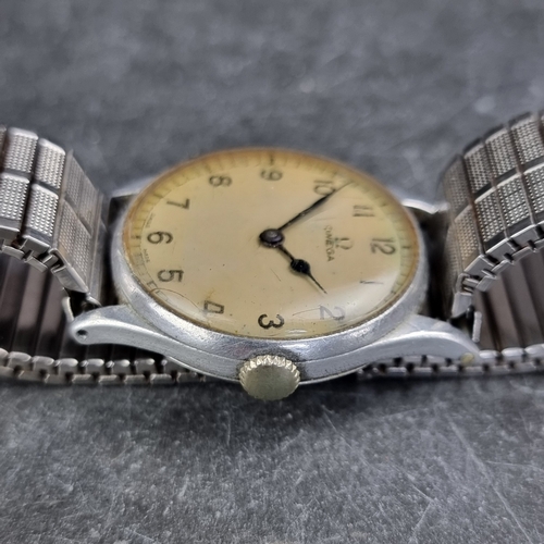 9 - A circa 1943 military issue RAF Omega aluminium alloy and stainless steel manual wind pilot's wristw... 