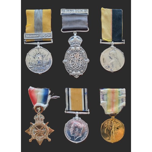 Medals: a rare and interesting Victorian and WWI medal group, to Lieutenant later Colonel H.G.A Moore, East Yorkshire Regiment, comprising: Khedives Sudan Medal, with Khartoum Clasp; Queen's Sudan Medal; and WWI trio; together with a Kaiser-i-Hind Medal to his sister, framed.