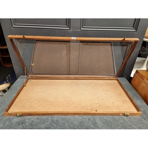 A mahogany table top shallow display case, 6cm high x 96.5cm wide x ...
