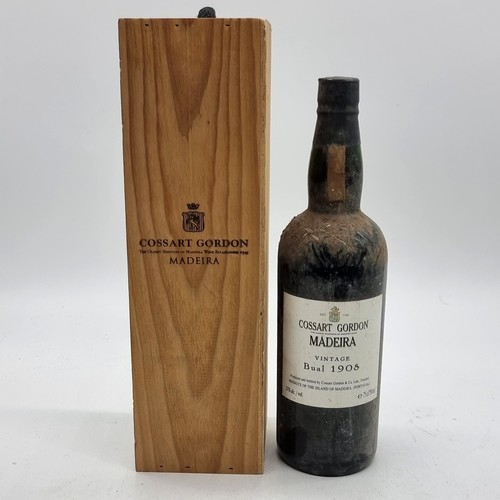 A 75cl bottle of 1908 Vintage 77 Year Old Bual Madeira, bottled in 1985 by Cossart Gordon, in OWC, with CoA.