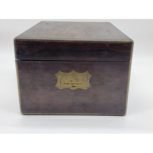 1449 - A Victorian rosewood and brass bound toilet box, the interior inscribed 'F. L. Hausburg, Manufacture... 