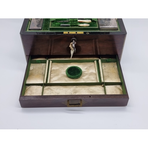 1449 - A Victorian rosewood and brass bound toilet box, the interior inscribed 'F. L. Hausburg, Manufacture... 