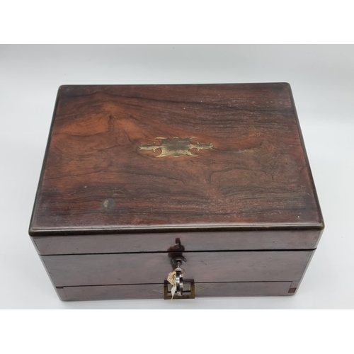 1449 - A Victorian rosewood and brass bound toilet box, the interior inscribed 'F. L. Hausburg, Manufacture... 