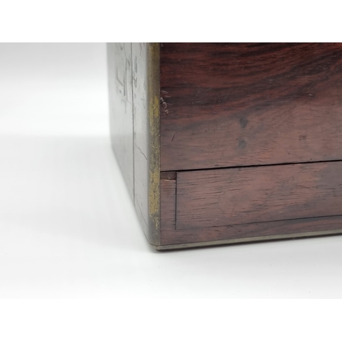 1449 - A Victorian rosewood and brass bound toilet box, the interior inscribed 'F. L. Hausburg, Manufacture... 